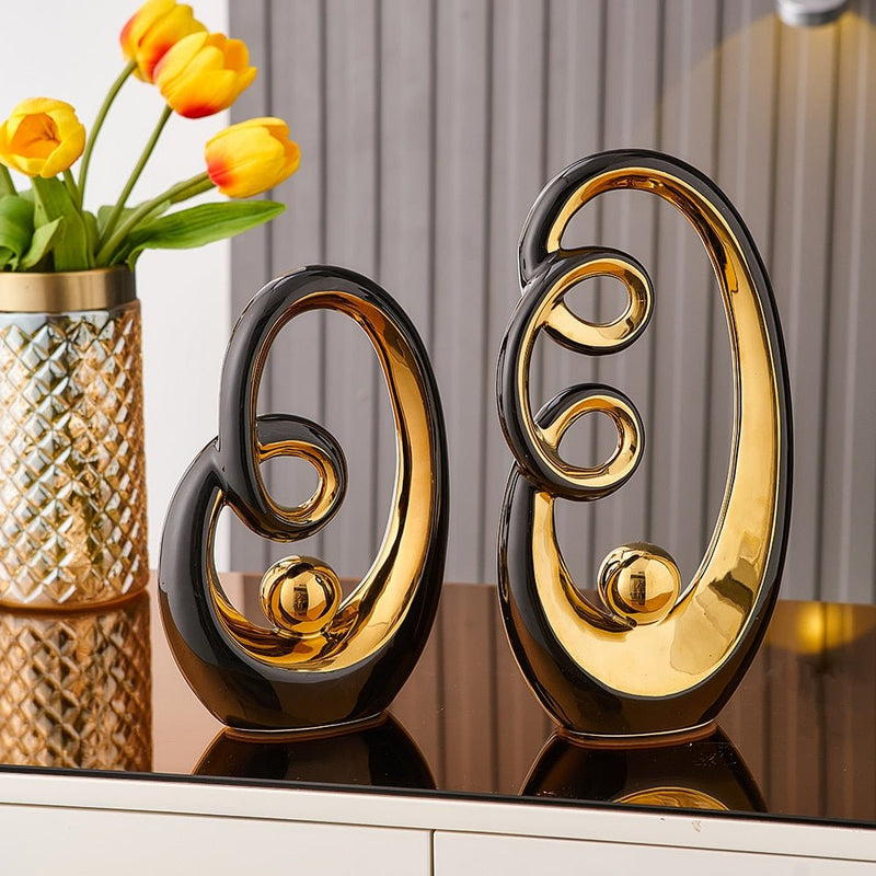 Estátuas em cerâmica com detalhes em dourado - Coleção Elegância Abstrata - Renova Lar