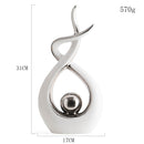 Estátuas em cerâmica com detalhes em dourado - Coleção Elegância Abstrata - Renova Lar